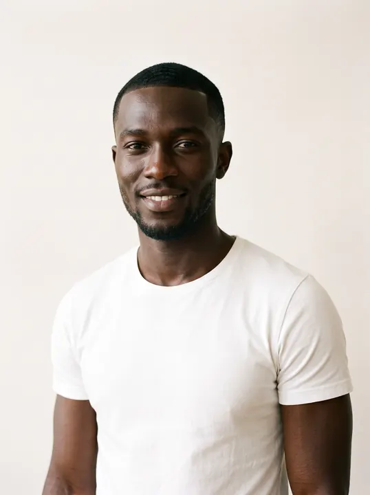 Kwame, a fictional AI model, in a white T-shirt